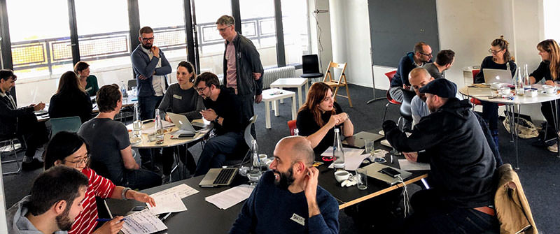 A photo showing attendees of the GUI + VUI. Multimodal Conversation Design Workshop.