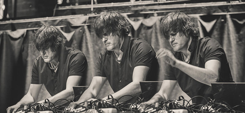 A set of three photos montaged into one with Tobi while playing live music