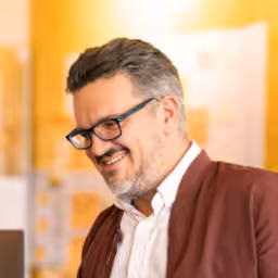 The logo of the side event Lunch Break Session: The Robot Uprising is Already Here. Let's Rise Together.